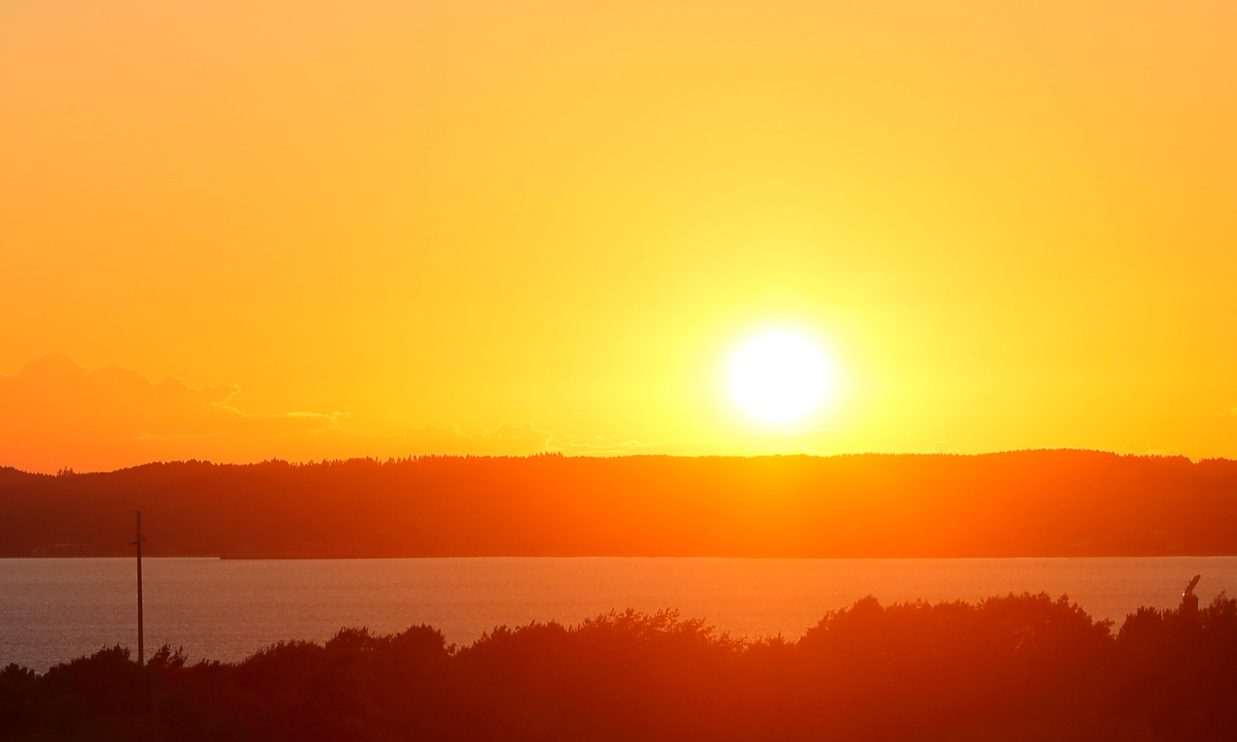Sonnenuntergang am Ahl Strand beim Ferienhaus mit Pool